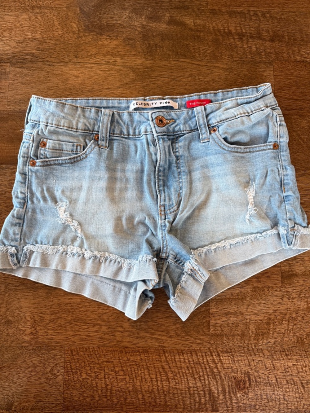 Celebrity Pink Faded Light Blue Distressed Denim Shorts
